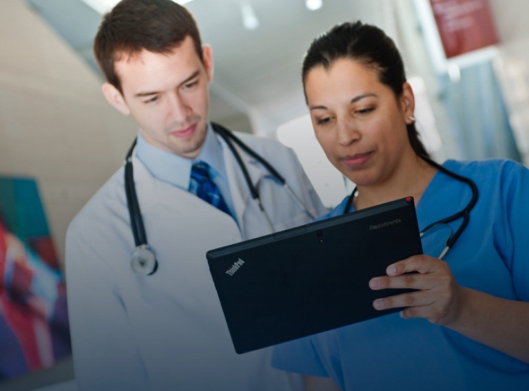 doctor and nurse using a lenovo tablet in a hospital
