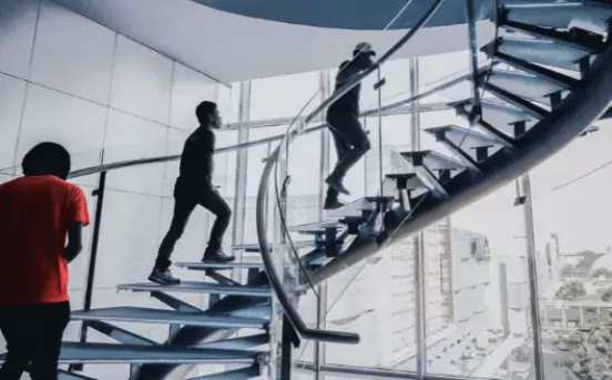 Three people on the stairs