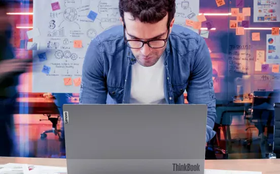 Man at ThinkBook Laptop